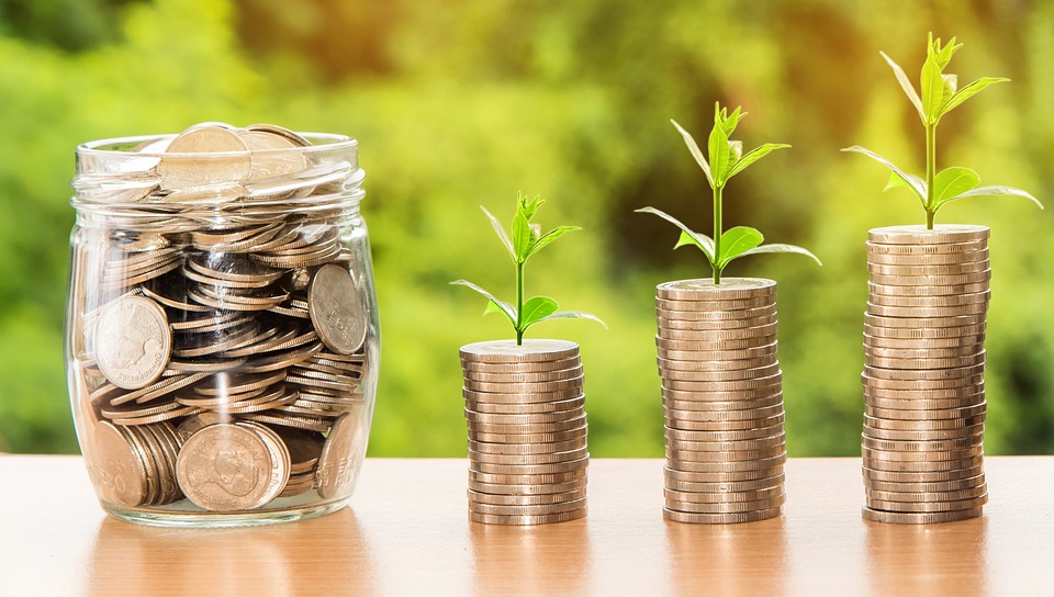 Coins stacks and coins in a jar. necessary for renting in Japan