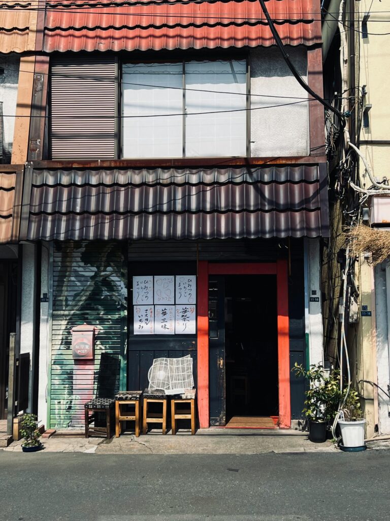 Rustic storefront in Nishi Nippori, Tokyo, reflecting traditional Japanese architecture.