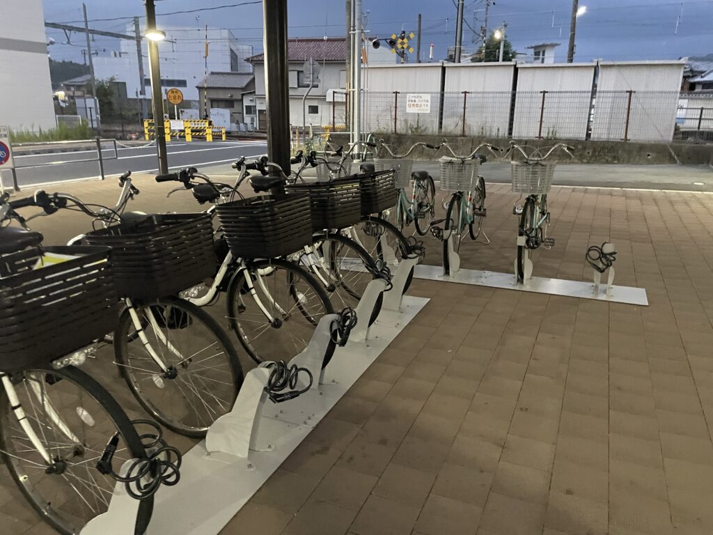 A row of rental bikes at Fukusaki Station, ready for tourists to explore the city.