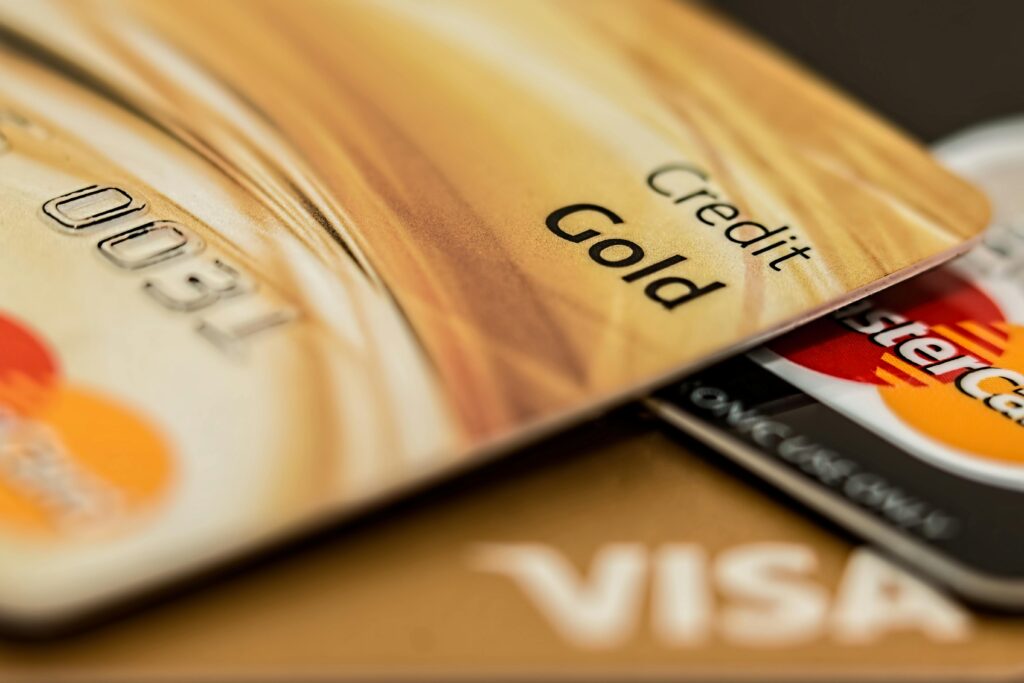 A close-up of credit cards, symbolizing financial planning and careful spending in Japan.