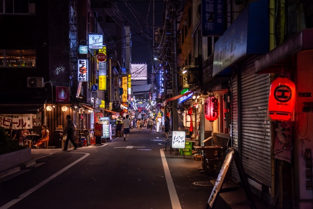 A lively restaurant district near Shimbashi Station, filled with izakayas and small eateries catering to salarymen and commuters.