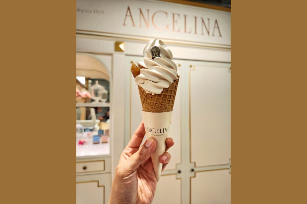 A beautifully swirled Mont Blanc soft-serve ice cream in a waffle cone, served at Angelina’s Harajuku location.