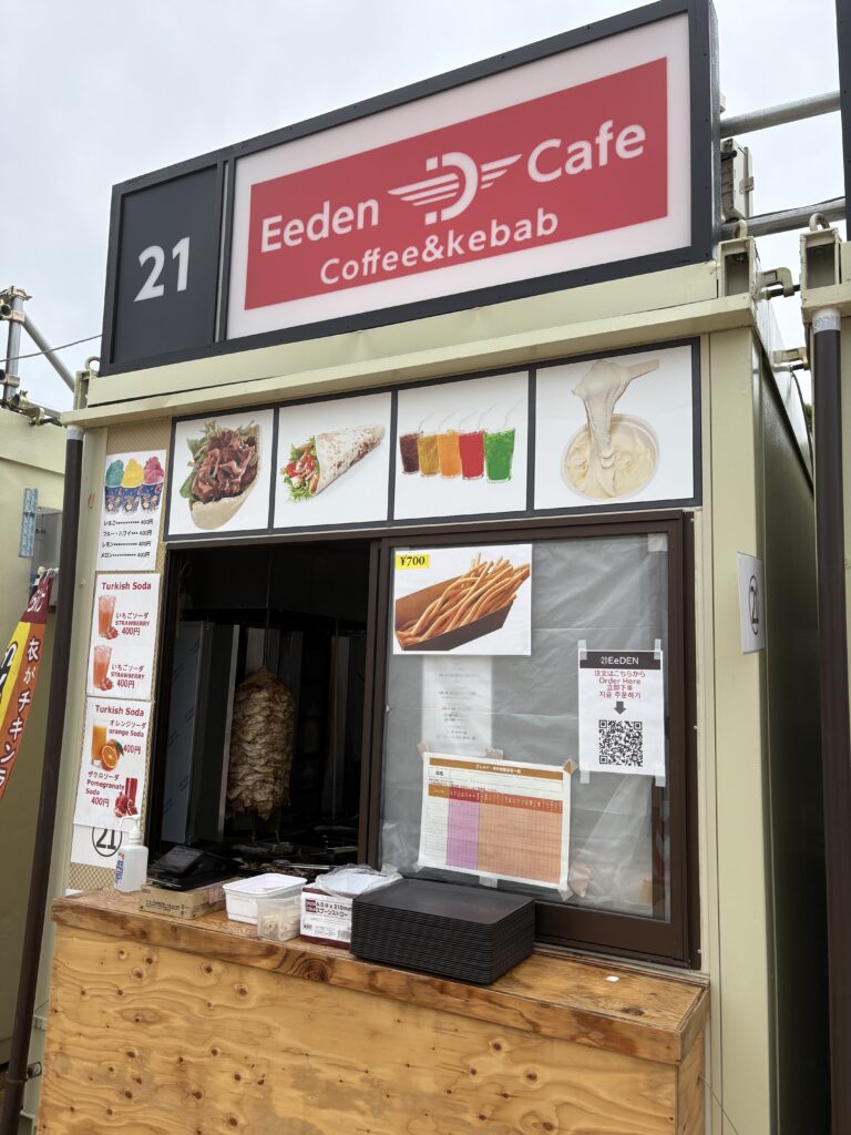 Eeden Cafe food booth selling kebabs, drinks, and Turkish soda at the Osaka expo.