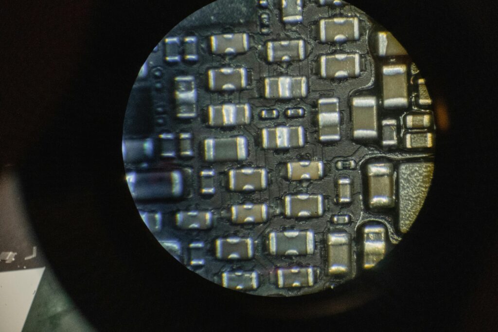 Zoomed-in circuit board showcasing detailed electronic components, common
