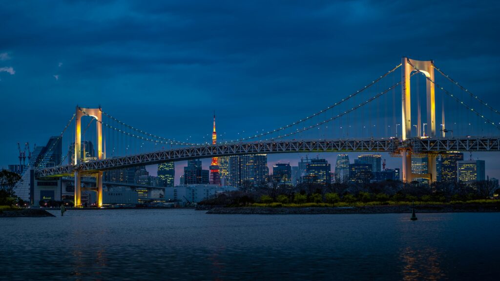 Night view of Rainbow Bridge from the Yurikamome line in Tokyo, Japan