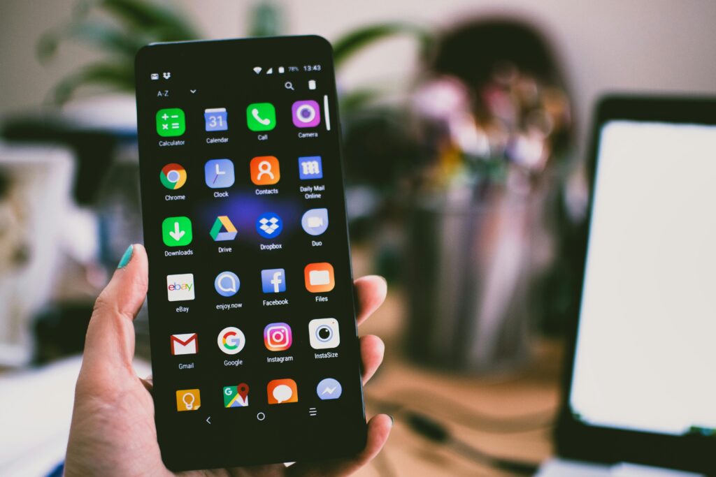 Smartphone with mobile apps used alongside SIM cards in Japan