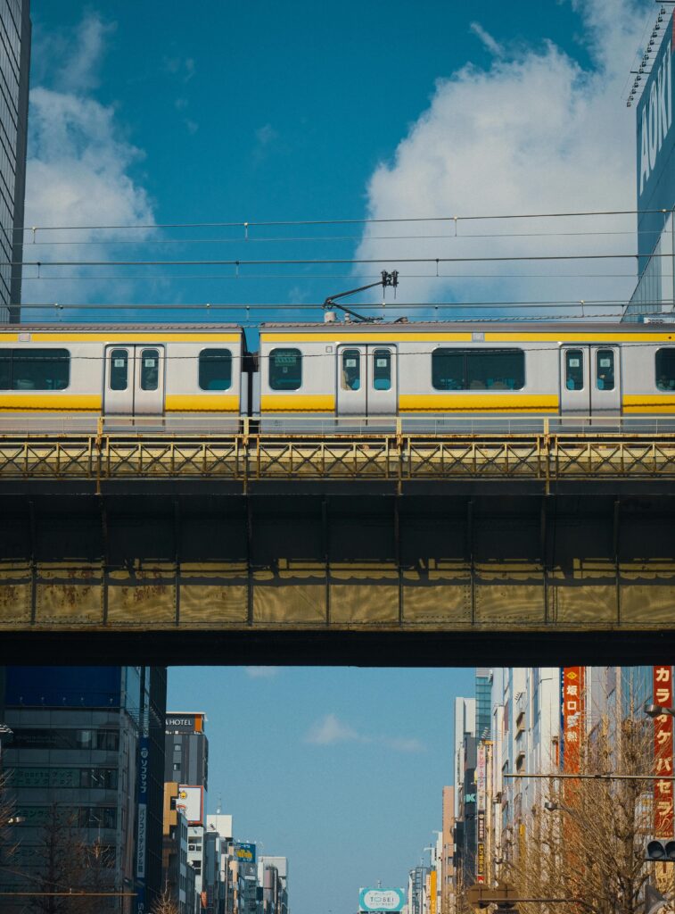 JR Chuo Line train at Nakano Station platform.