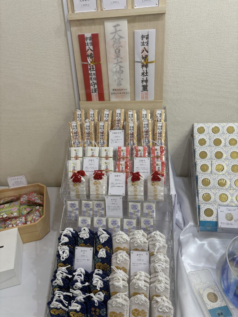 Close-up of two summer-themed goshuin stamps from Wakinohama Shrine, decorated with sea life and fireworks motifs.