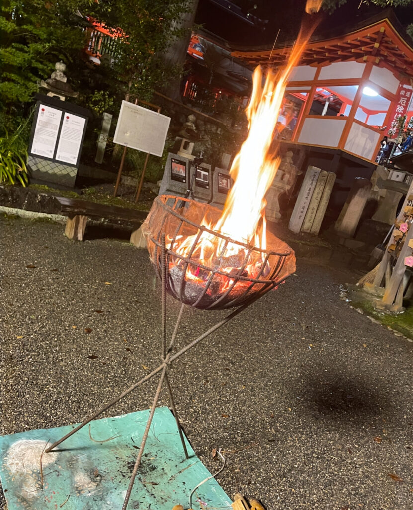 Fire basket burning brightly at Inamura Fire Festival in Yuasa.