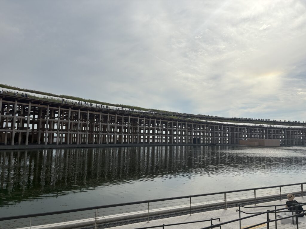 Wooden ring walkway over water at Osaka Expo 2025