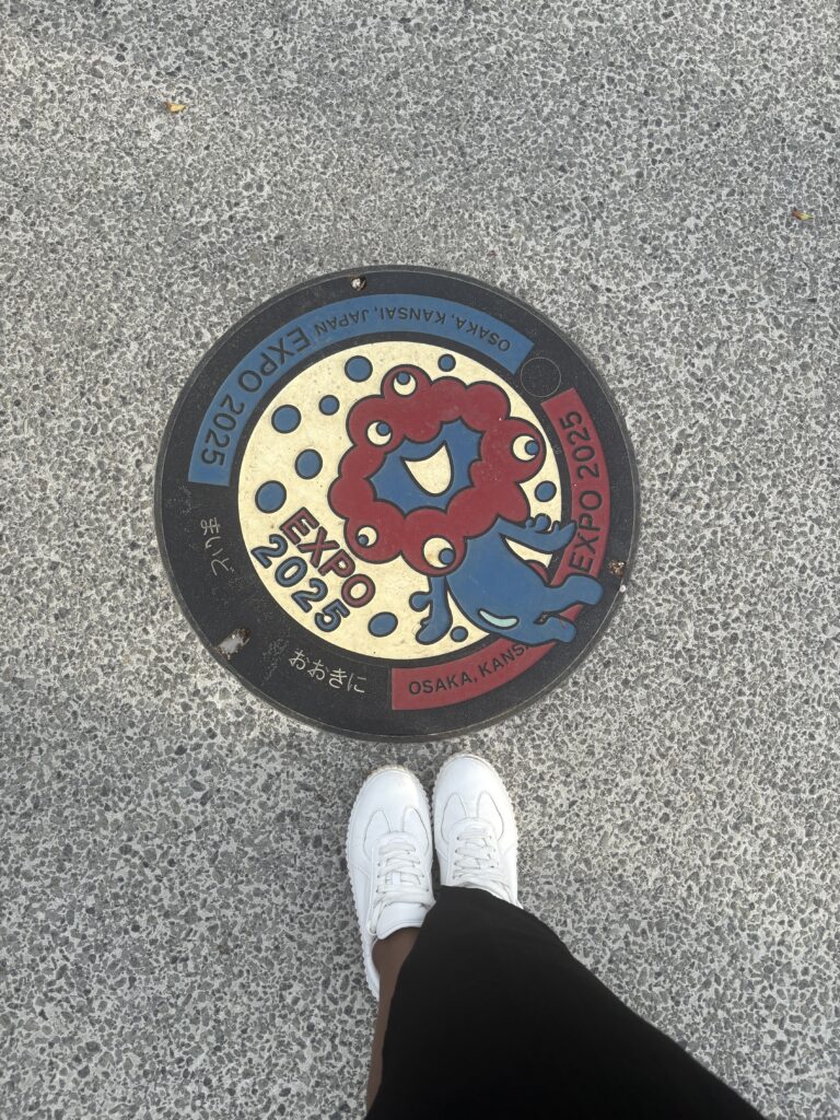 Osaka Expo 2025 themed manhole cover with mascot
