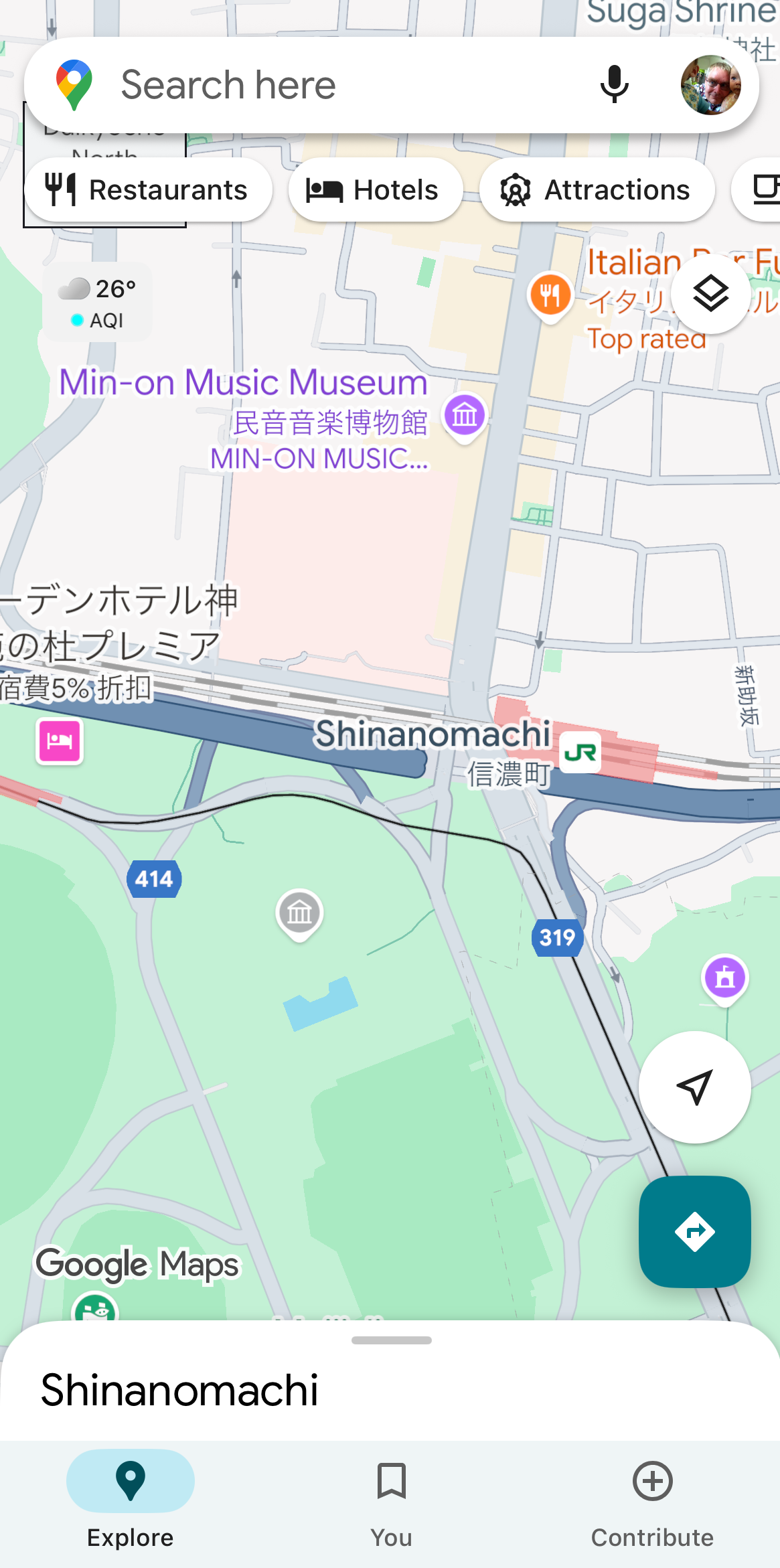 Google Maps station area map showing detailed surroundings of Tokyo train stations and nearby businesses.