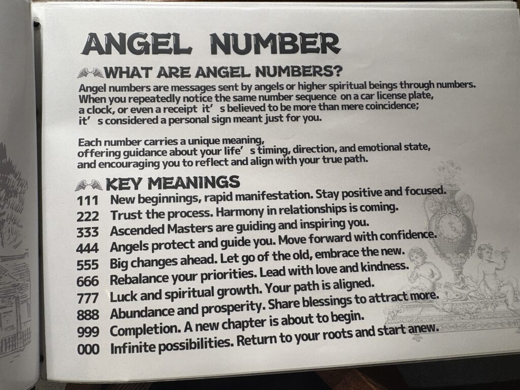 A printed page explaining the meanings of angel numbers, including definitions and interpretations for repeating number sequences like 111, 222, and 999.
