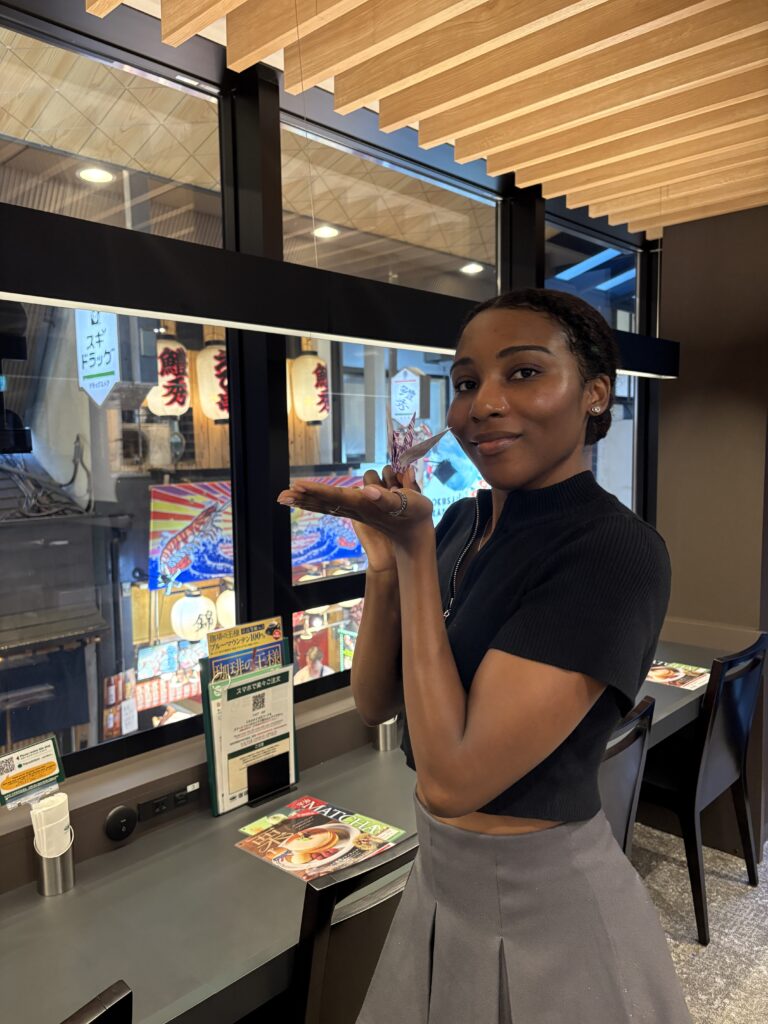 Top view of a pearl-accented bun hairstyle.