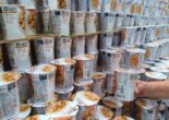 Stacks of Japanese cup noodles displayed in a store aisle