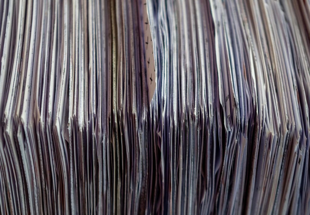 Stack of organized paper files