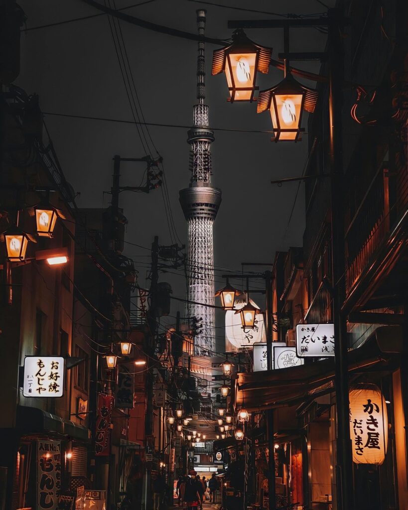A recreated Edo-era street scene showing traditional buildings and everyday life in old Tokyo.