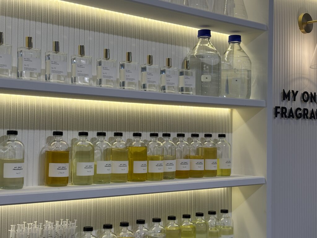 Rows of fragrance oils and perfume samples at MY ONLY FRAGRANCE, where visitors can explore dozens of scents to create a personalized perfume.