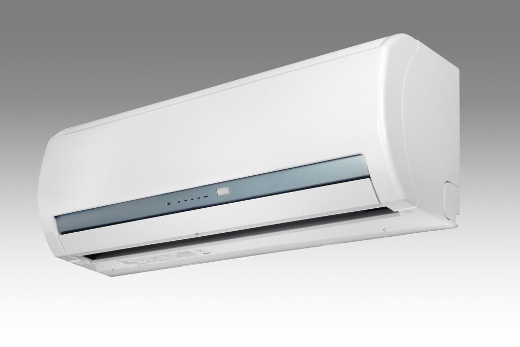 White wall-mounted air conditioner commonly used in Japanese apartments.