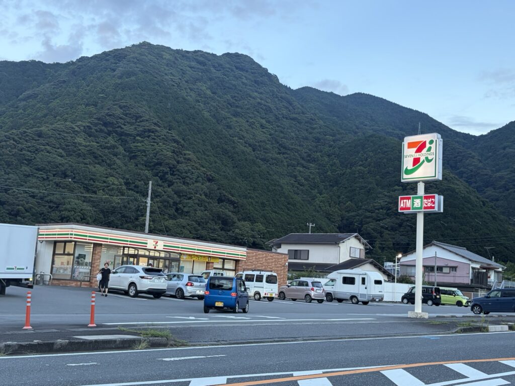7-Eleven convenience store surrounded by mountains near Koganezaki in Nishiizu.