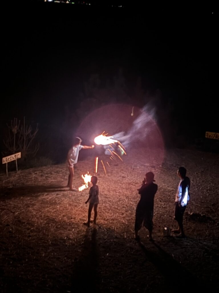 Fire performance at night during a camping trip in Koganezaki, Izu.