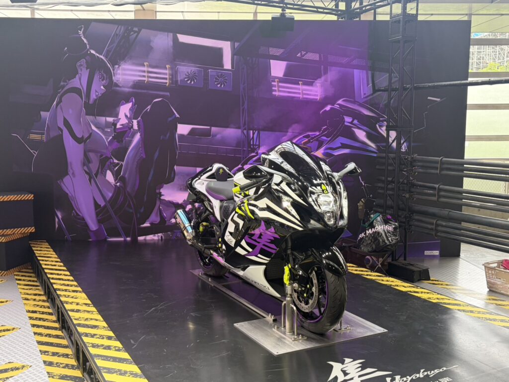 Suzuki motorcycle displayed as part of a gaming collaboration at Tokyo Game Show 2026.