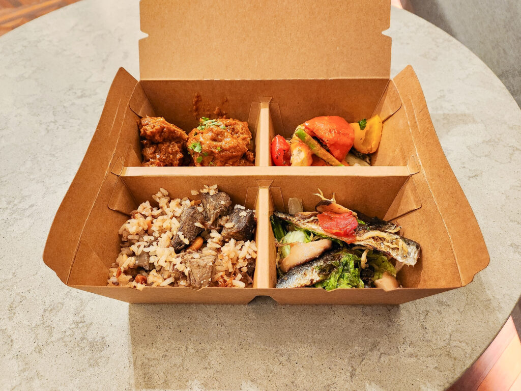 Customizable healthy bento box with rice, vegetables, and savory side dishes from The Balancing Lab at Takanawa Gateway City