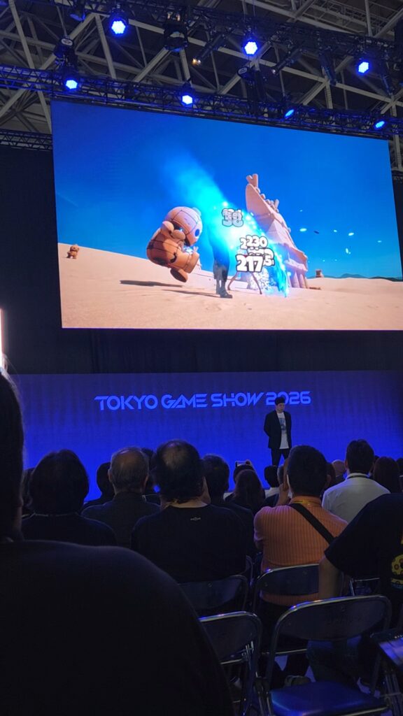 Monster-cooking gameplay from RYUGU NATION TOTTORI REALM featuring Tottori Curry Plus during a presentation at Tokyo Game Show 2026.
